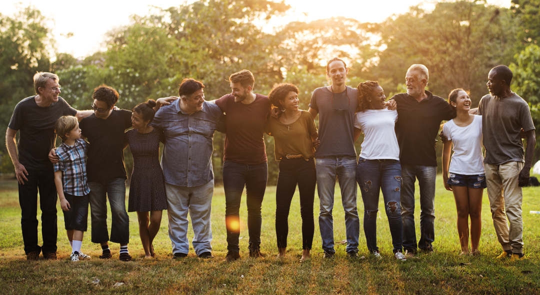 Group of people support unity arm around together